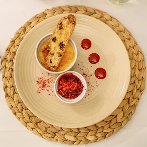 Raspberry and vanilla brulee — Fruit and nut biscotti, berry compote