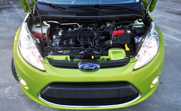 The Fiesta engine bay featuring a 1.6L DOHC 4 cylinder engine with VCT