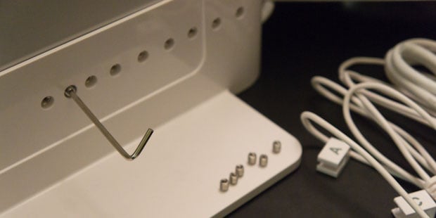Screwing in cables into the Henge Docks docking station
