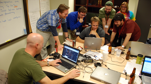 Startup Weekenders having fun and watching clips from a commercial they were filming